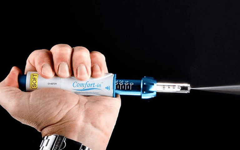 Hand holding a syringe with needle, promoting injection-free anesthesia for hair treatments.